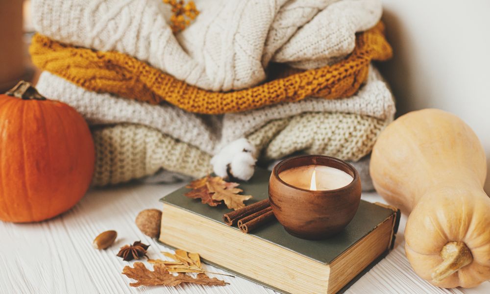 autumn jumpers, candle, pumpkin. butternut squash